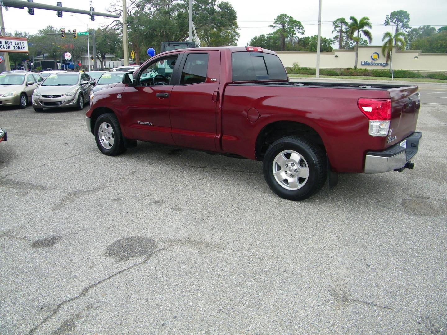 2010 Maroon /Gray Toyota Tundra SR5 Double Cab 4.6L 2WD (5TFRM5F14AX) with an 4.6L V8 DOHC 32V engine, 5-Speed Automatic Overdrive transmission, located at 4000 Bee Ridge Road, Sarasota, FL, 34233, (941) 926-0300, 27.298664, -82.489151 - Photo#3